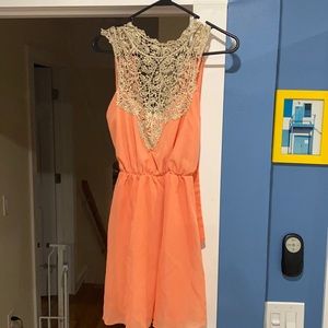 Coral dress, tags still on.